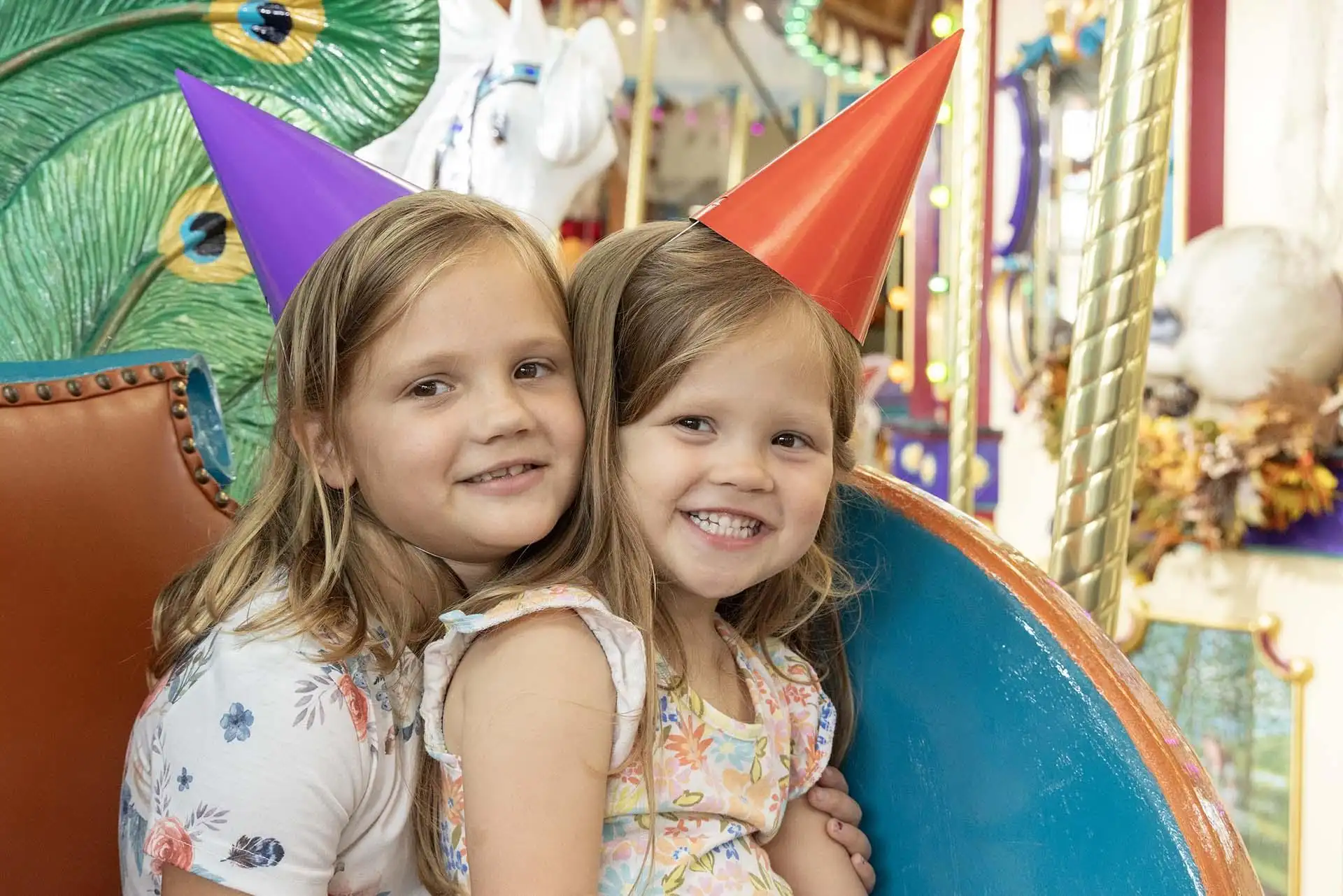 Kids wearing party hats.